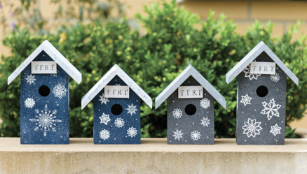 4 birdhouses in blue or gray with stenciled snowflakes